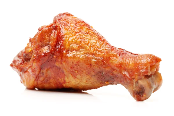 Barbecued chicken leg on white background — Stock Photo, Image