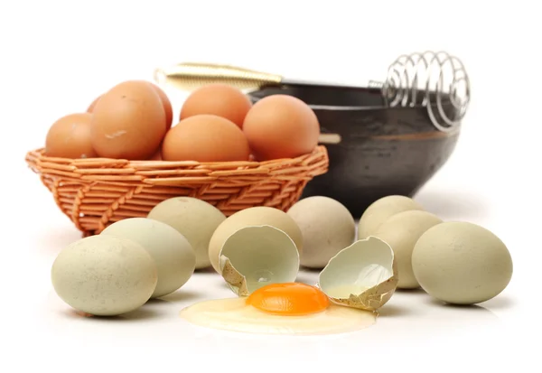 Chicken eggs and egg yolk — Stock Photo, Image