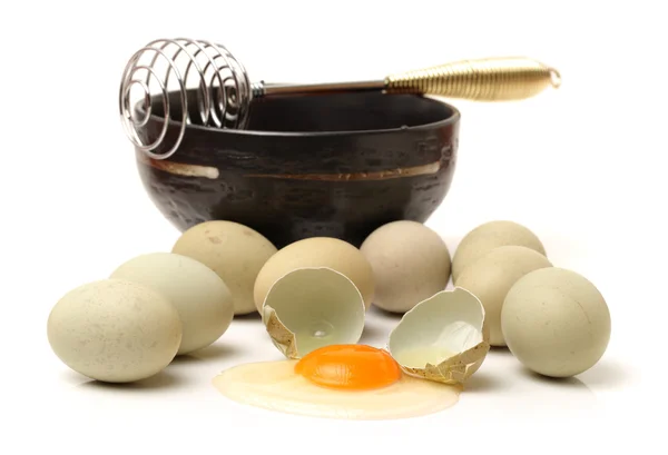Chicken eggs and egg yolk — Stock Photo, Image