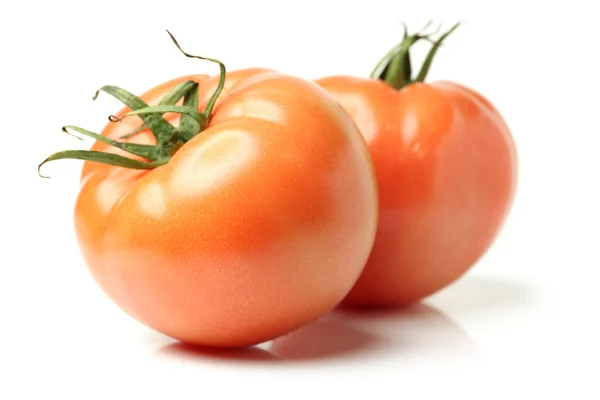 Fresh tomatoes on white — Stock Photo, Image