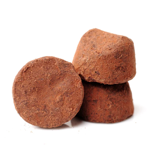 Chocolate truffles on white — Stock Photo, Image