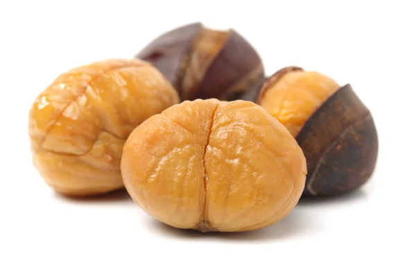 Sweet chestnuts on white — Stock Photo, Image