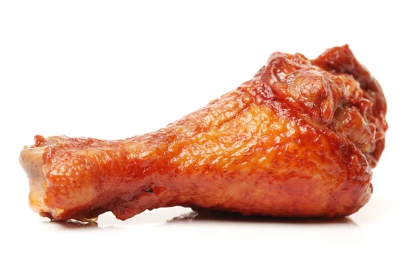 Barbecued chicken leg on white — Stock Photo, Image