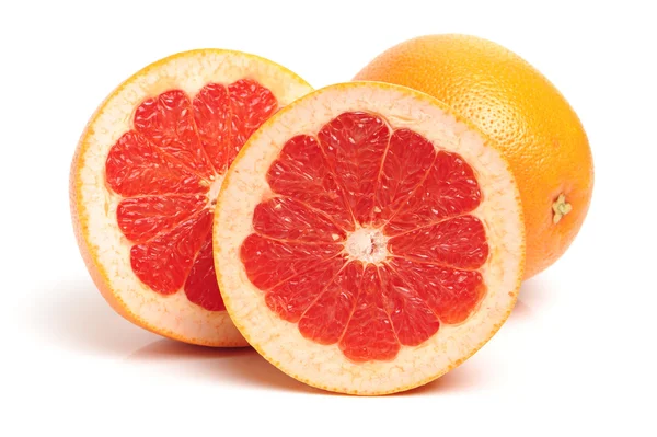 Grapefruit with segments on a white — Stock Photo, Image