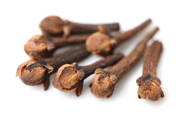 Dry cloves on white — Stock Photo, Image