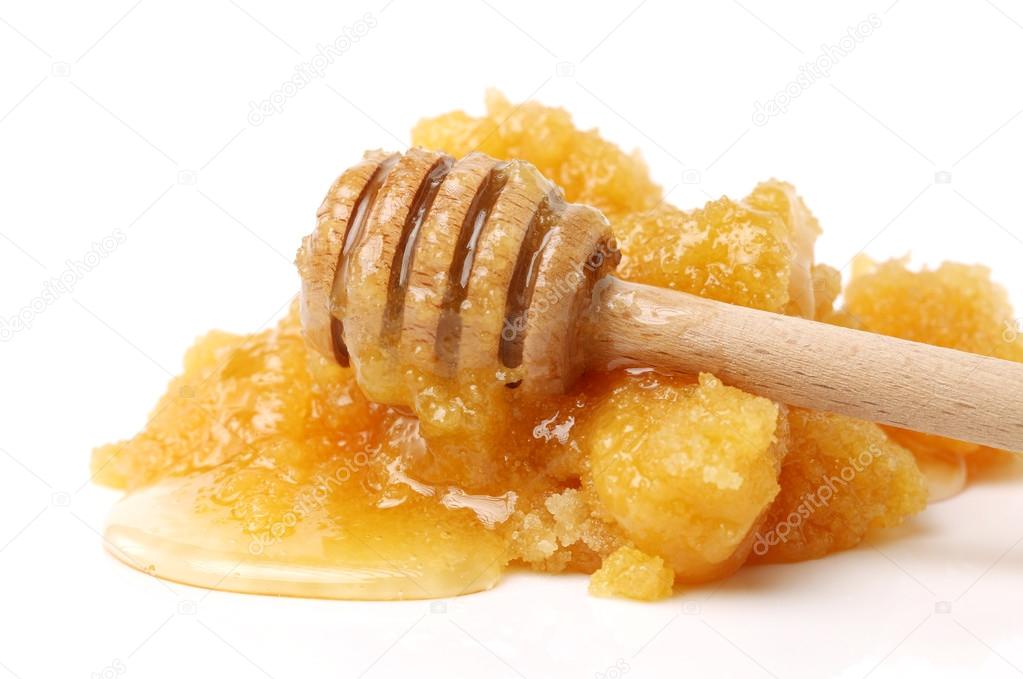 naturally crystallized honey with spoon