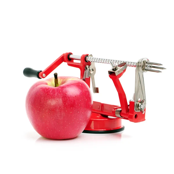 Κόκκινο μήλο με αποφλοιωτή — Φωτογραφία Αρχείου