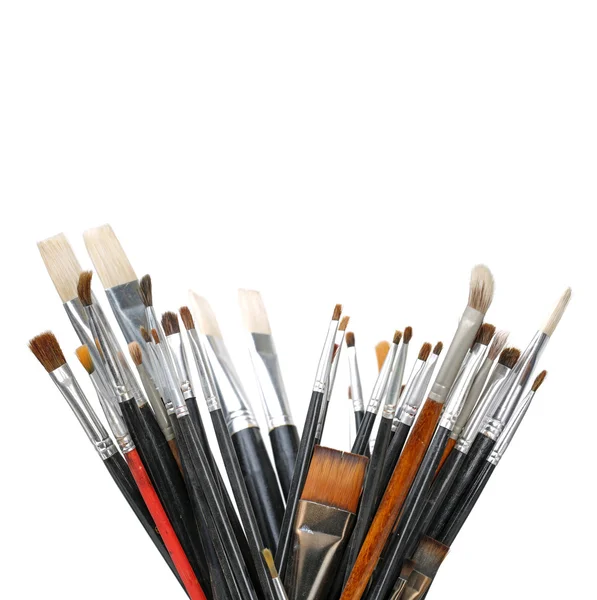 Paint brushes in glass — Stock Photo, Image