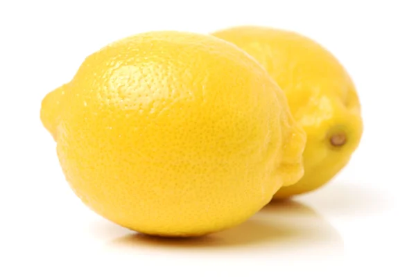 Fresh lemons on white — Stock Photo, Image