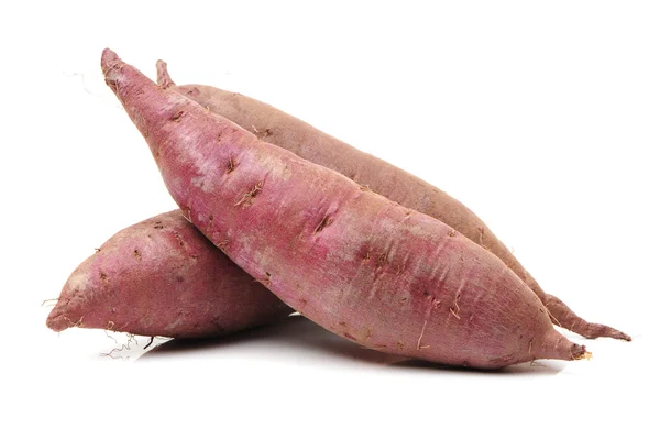 Sweet potatoes on the white — Stock Photo, Image