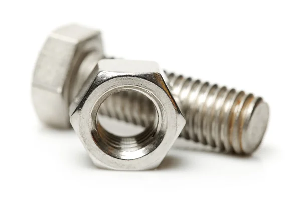 Bolt and nut on white — Stock Photo, Image