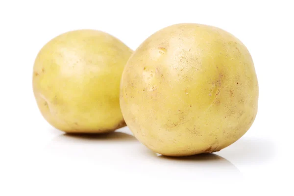 Zwei geschälte Kartoffeln — Stockfoto