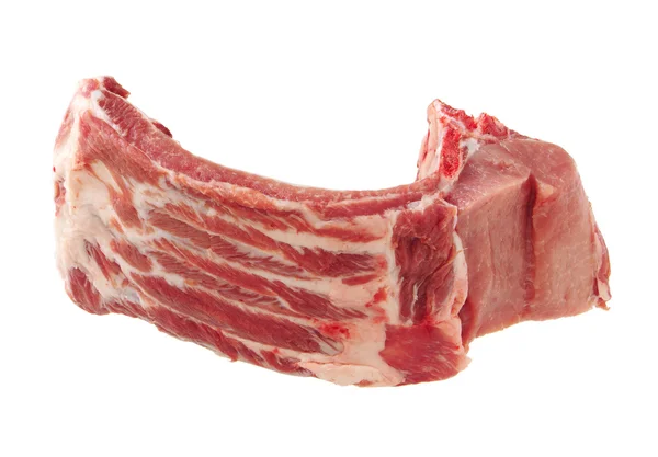 Stuk van rauw vlees op ribs — Stockfoto