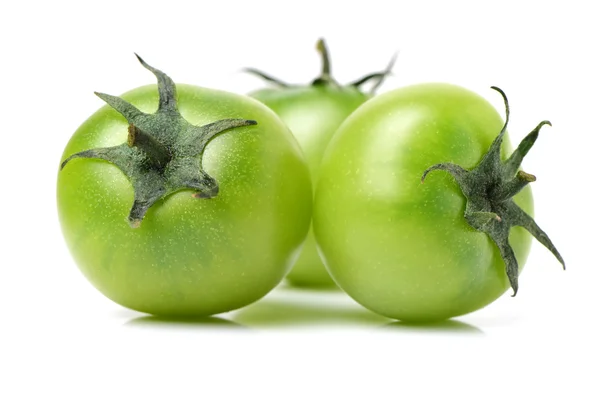 Целые зелёные помидоры — стоковое фото