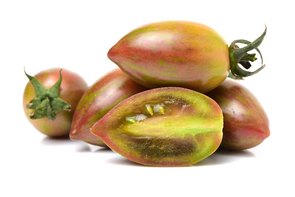 Whole and sliced half green tomatoes — Stock Photo, Image