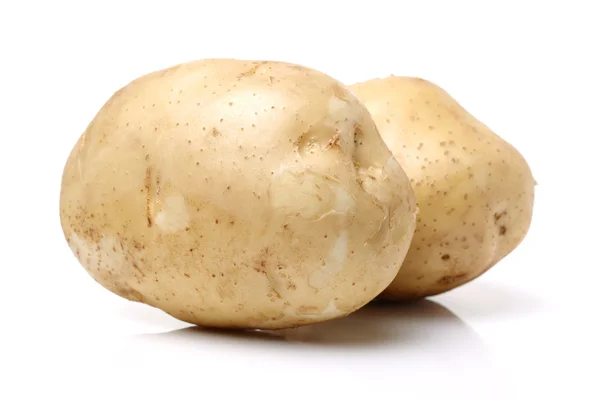 Två nya rå potatis — Stockfoto