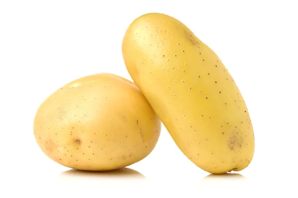 Två nya rå potatis — Stockfoto