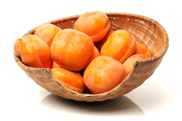 Sweet Persimmons in bowl — Stock Photo, Image
