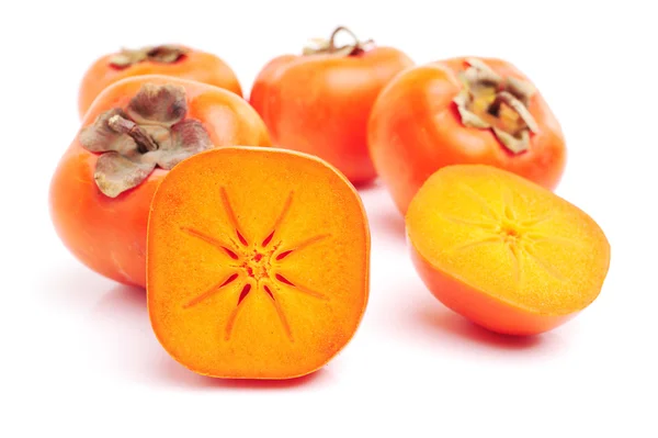 Hög med färska sharonfrukt — Stockfoto