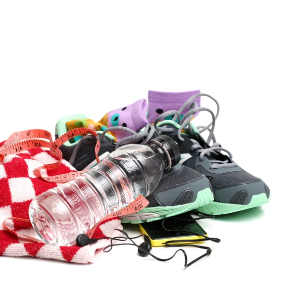 Sportovní obuv a doplňky posilovny — Stock fotografie