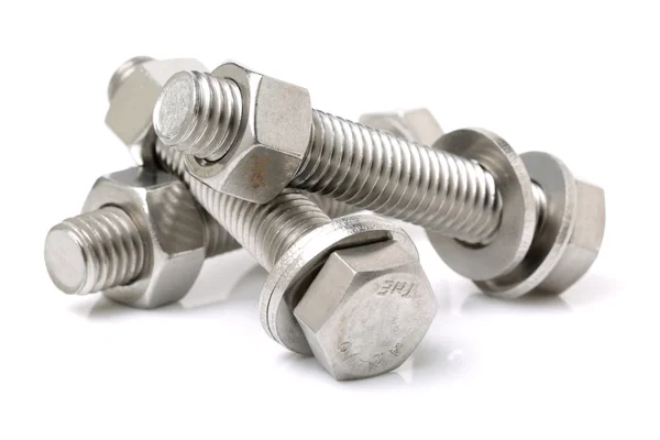 Three bolts with nuts — Stock Photo, Image