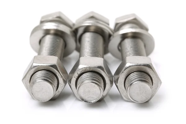 Three bolts with nuts — Stock Photo, Image