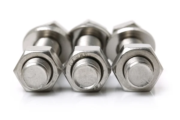 Three bolts with nuts — Stock Photo, Image