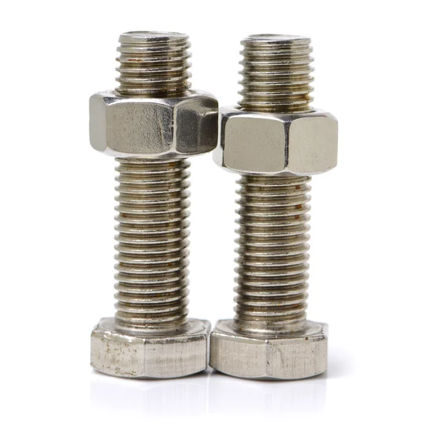 Two glossy bolts with nuts — Stock Photo, Image