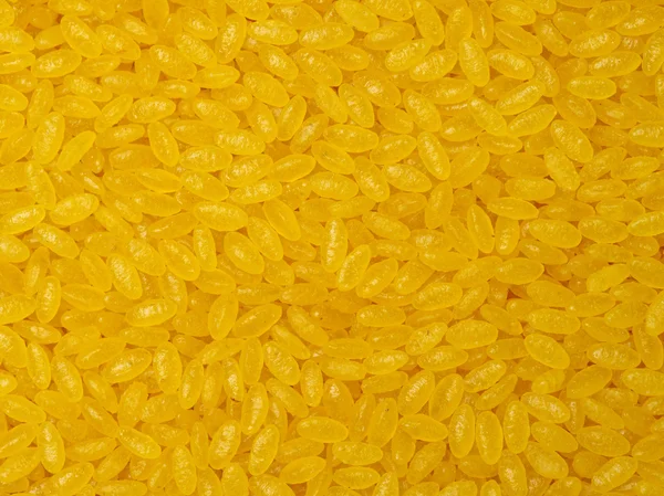 Vista de perto do arroz amarelo — Fotografia de Stock