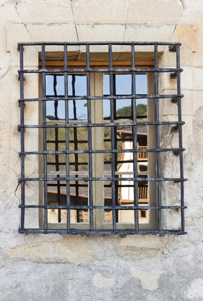 Wrought iron grille window — Stock Photo, Image