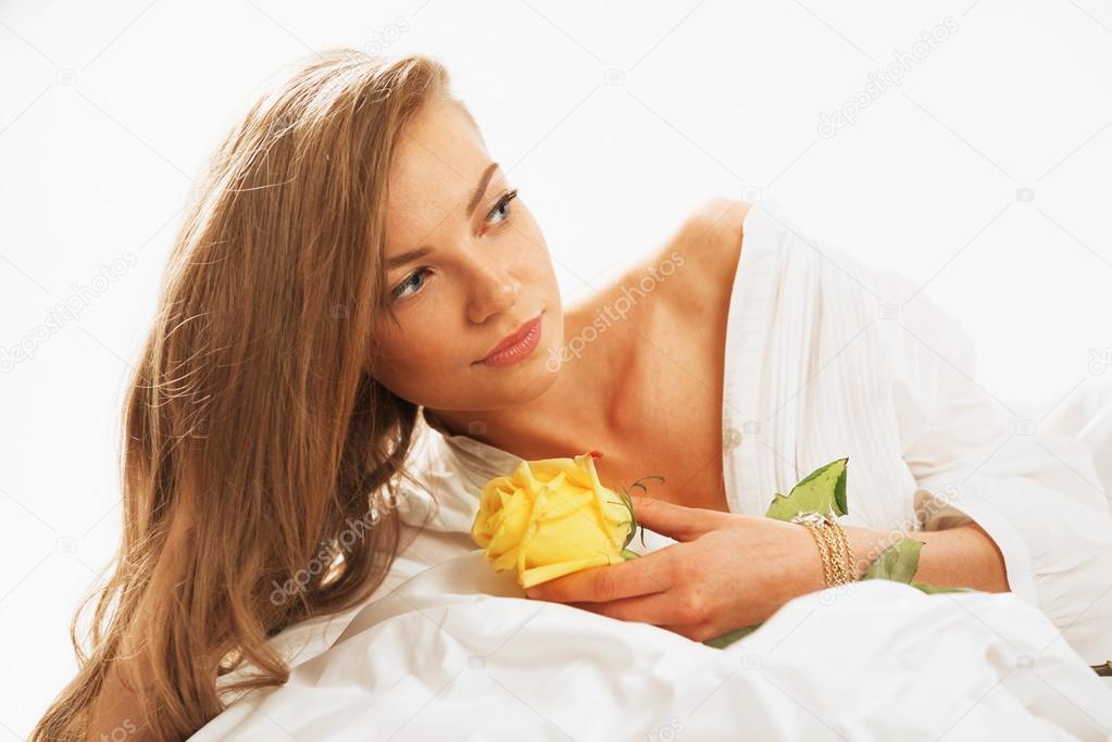 Portrait of young beautifulwoman waking up in the morning on the