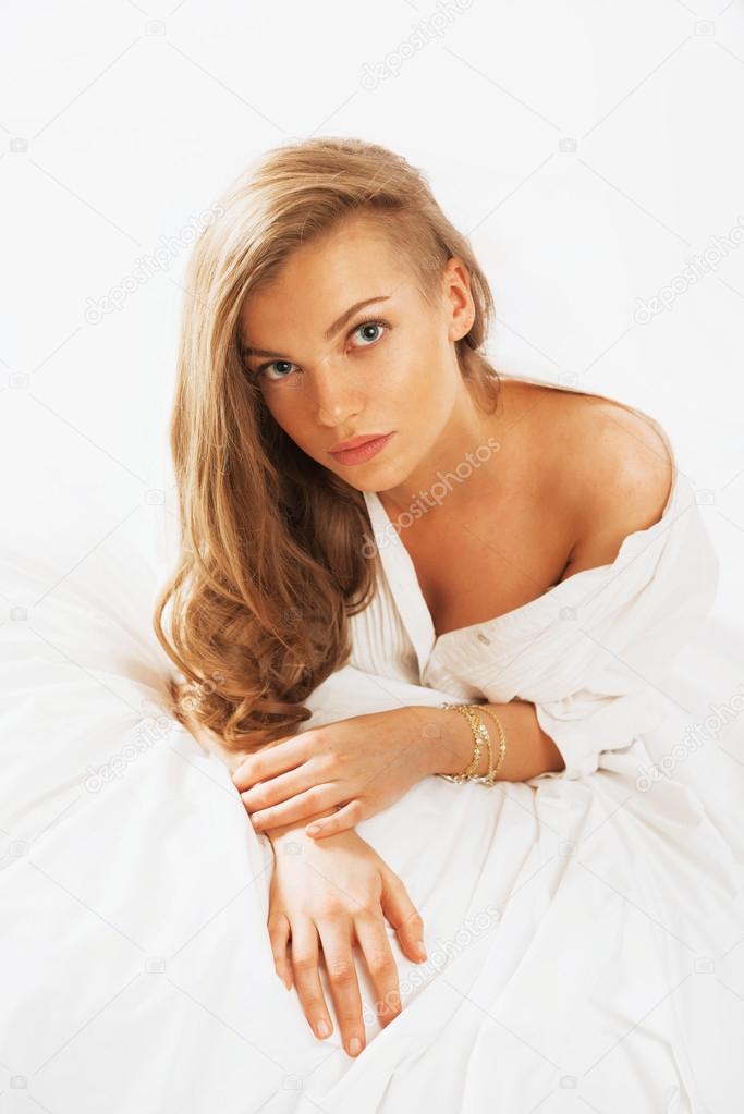 Portrait of young beautifulwoman waking up in the morning on the