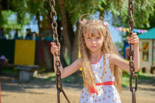 Happy little girl five years old wearing summer dress having fun — Stock Photo, Image