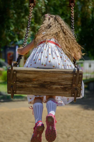 Happy little girl five years old wearing summer dress having fun — Stock Photo, Image