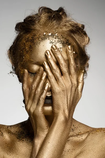 Gouden vrouw — Stockfoto