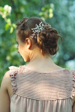 Girl with beautiful updo hairstyle clipart