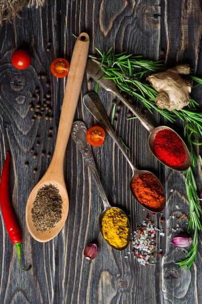 Spices over wooden background — Stock Photo, Image