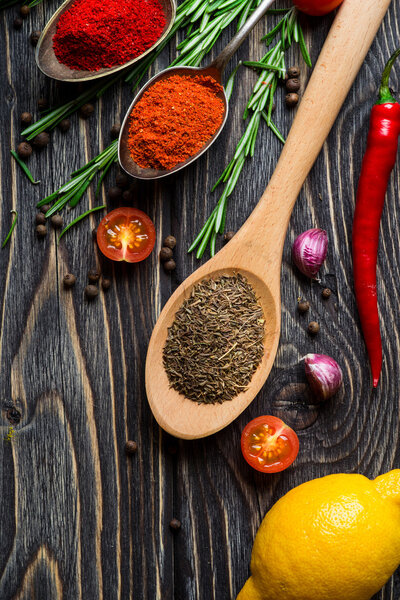 Spices over wooden background