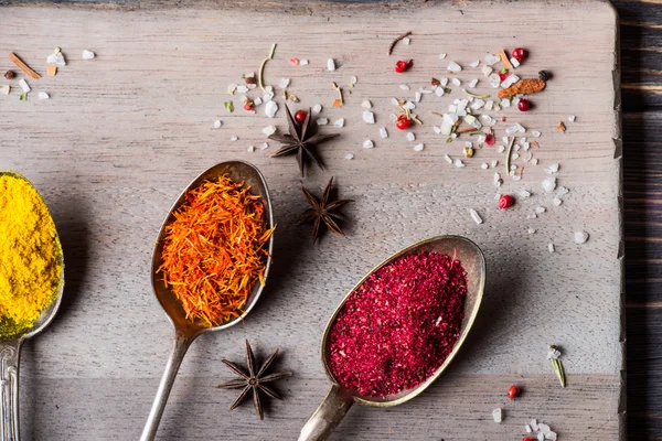 Spices over wooden background — Stock Photo, Image