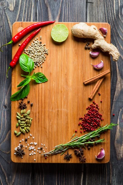 Spices over wooden background — Stock Photo, Image