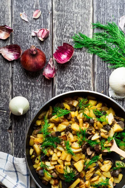 Fried potato in iron pan — Stock Photo, Image