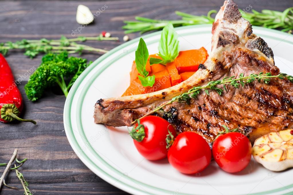 Steak with vegetable garnish