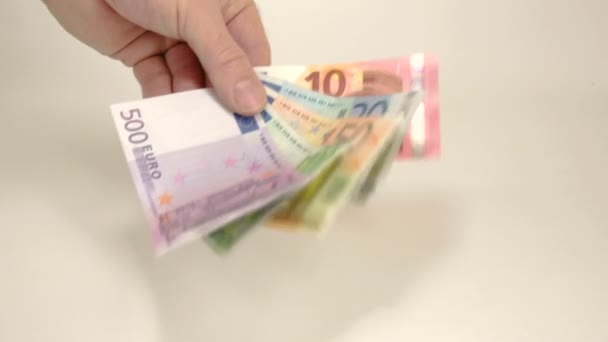 Billetes en euros ondeados a mano — Vídeo de stock