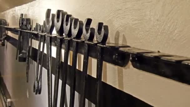 Hardware tools hanging on the wall — Stock Video