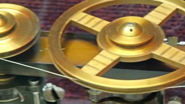 Few gold pulley levers with string — Stock Video