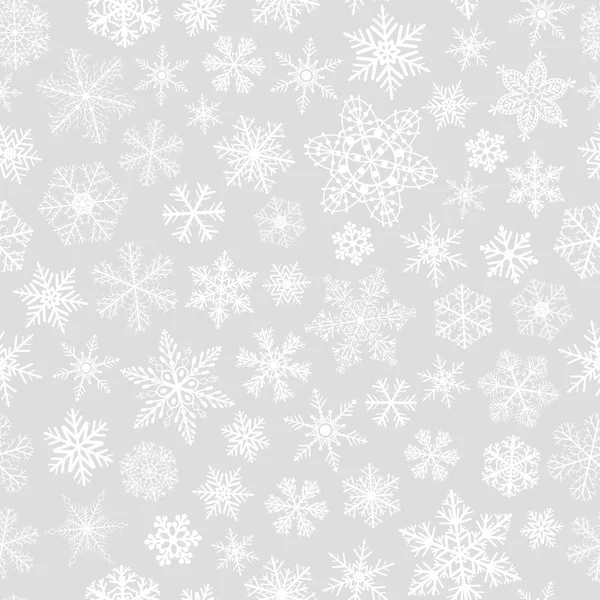 Seamless pattern of snowflakes, white on gray — Stock Vector