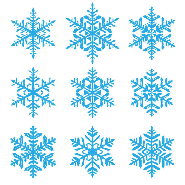 Набор красивых сложных рождественских снежинок, светло-голубой на белом фоне