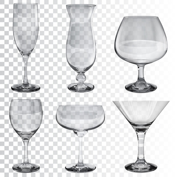 Набор пустых прозрачных стеклянных бокалов для различных напитков
