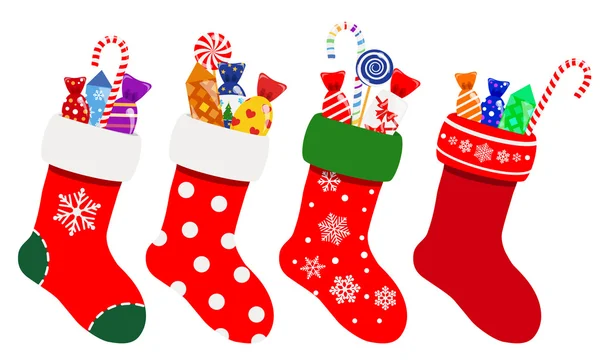 Calcetines de Navidad con caramelos — Vector de stock