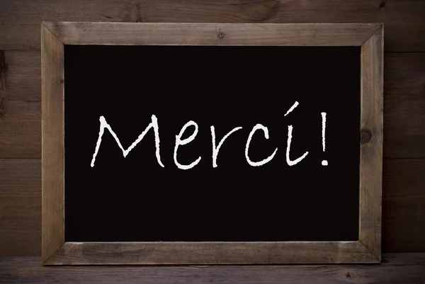 Chalkboard With Merci Means Thank You — Stock Photo, Image